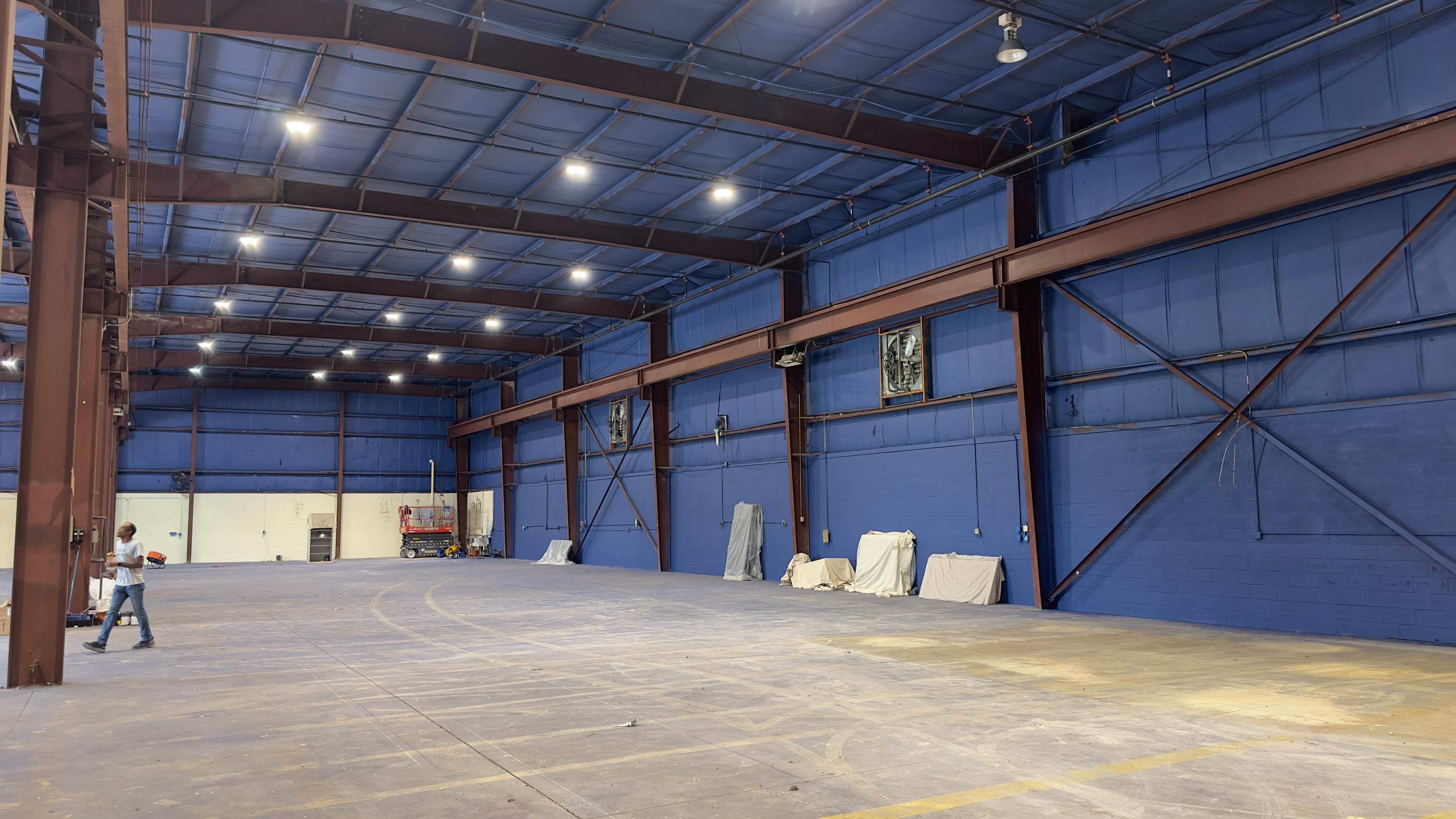 Indoor court space ready for lines and nets